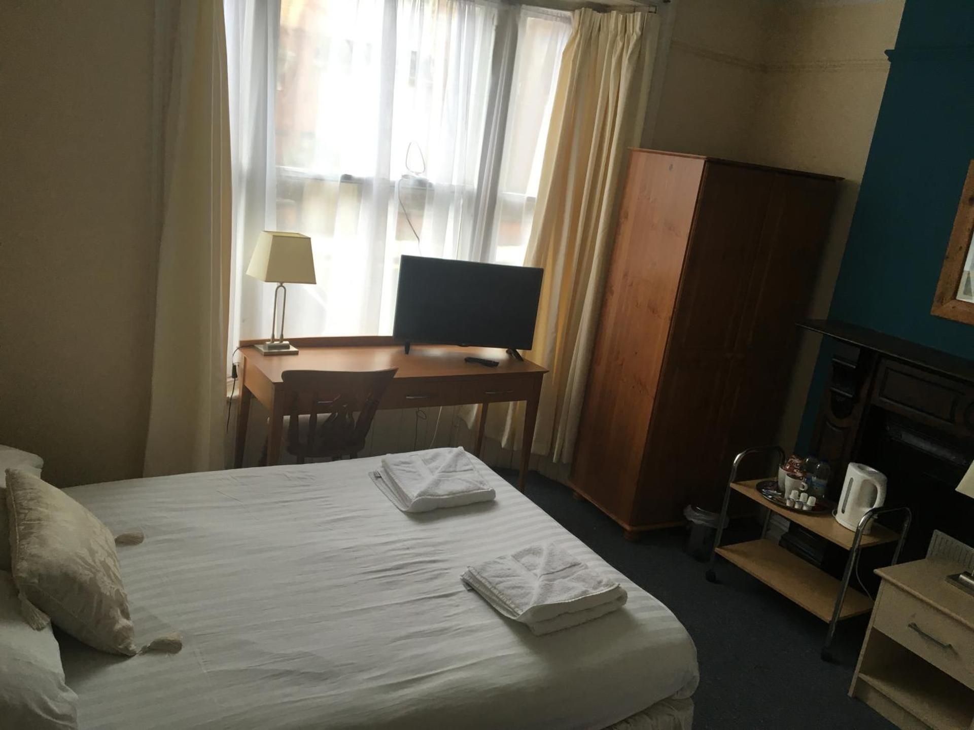 Economy Triple Room with Shared Bathroom