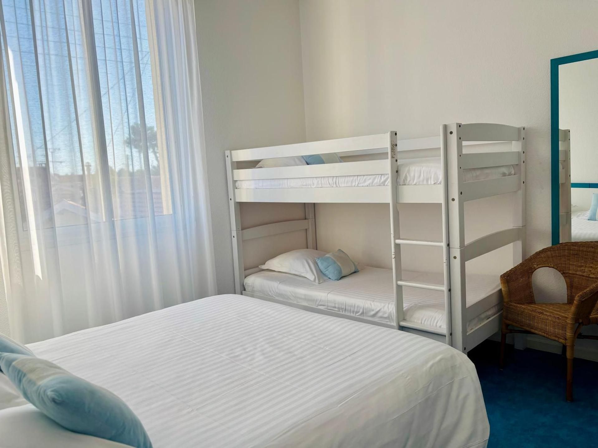Quadruple Room (2 Adults + 2 Children)