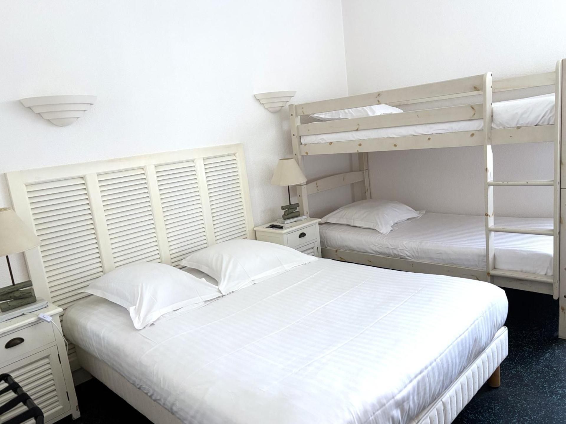 Quadruple Room (2 Adults + 2 Children)