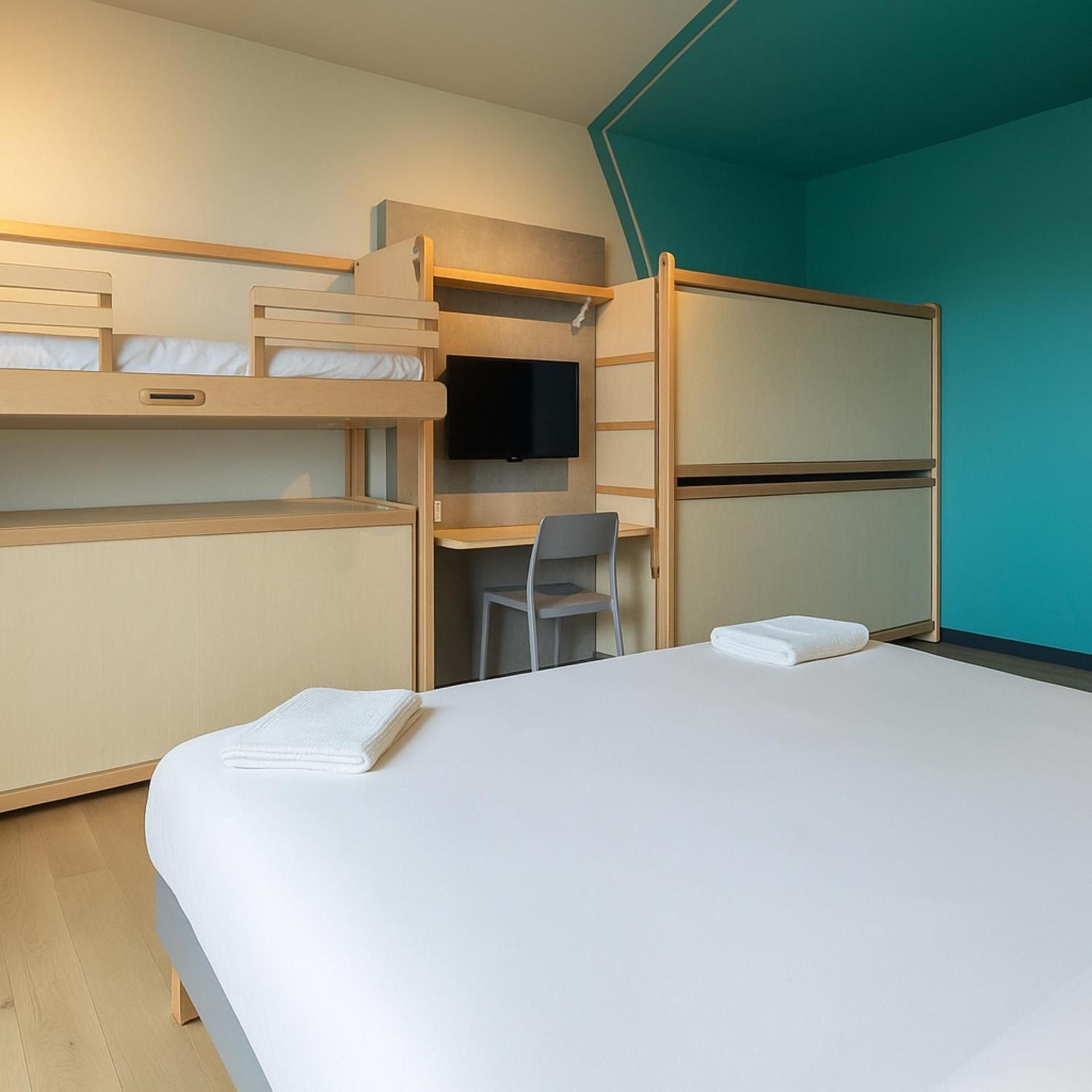 Tribu room with 1 double bed, 2 bunk beds