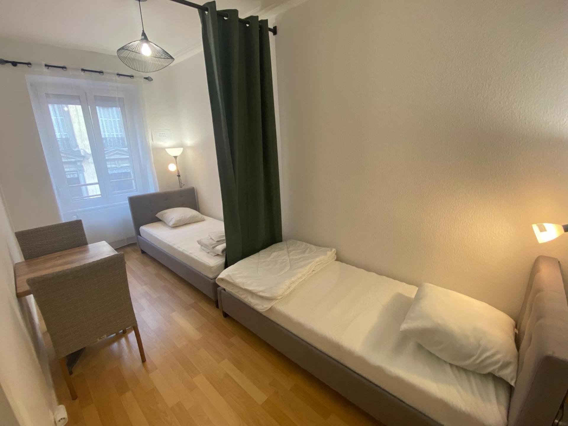 Single Bed in Dormitory Room