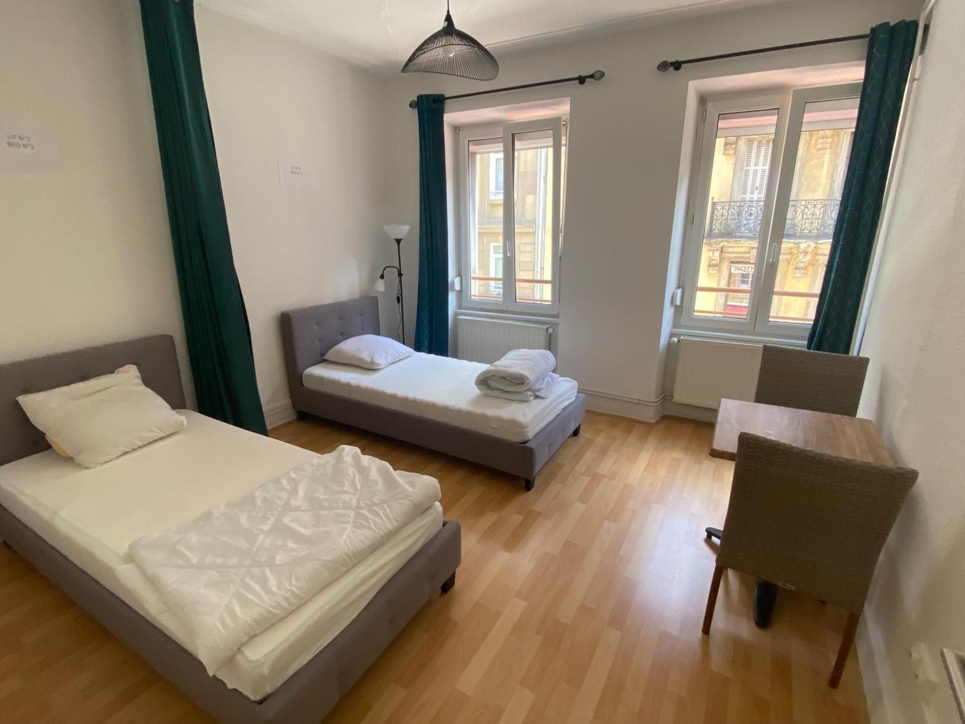 Single Bed in Dormitory Room