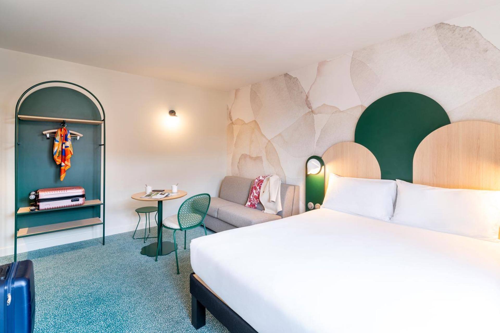 Comfort room with 1 queen-size bed and 1 sofa bed
