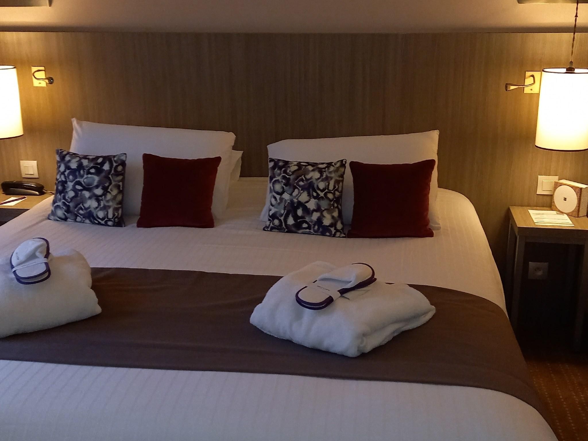 privilege room with king-size bed and sofa