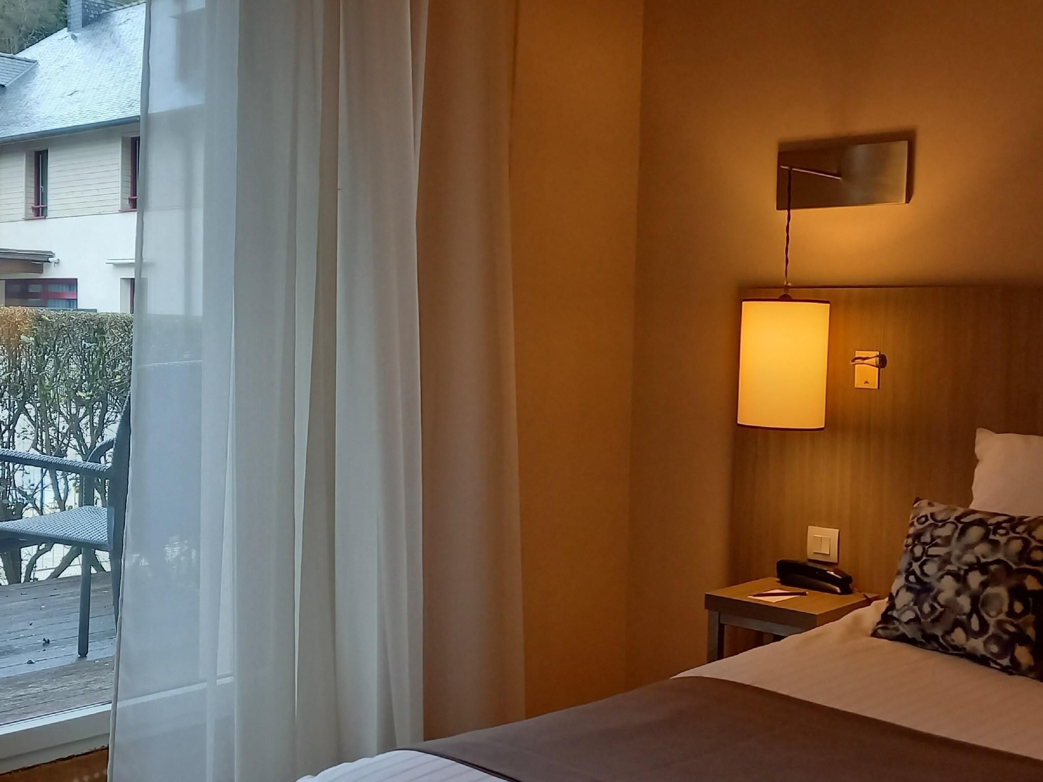 Standard Room with king-size bed and balcony