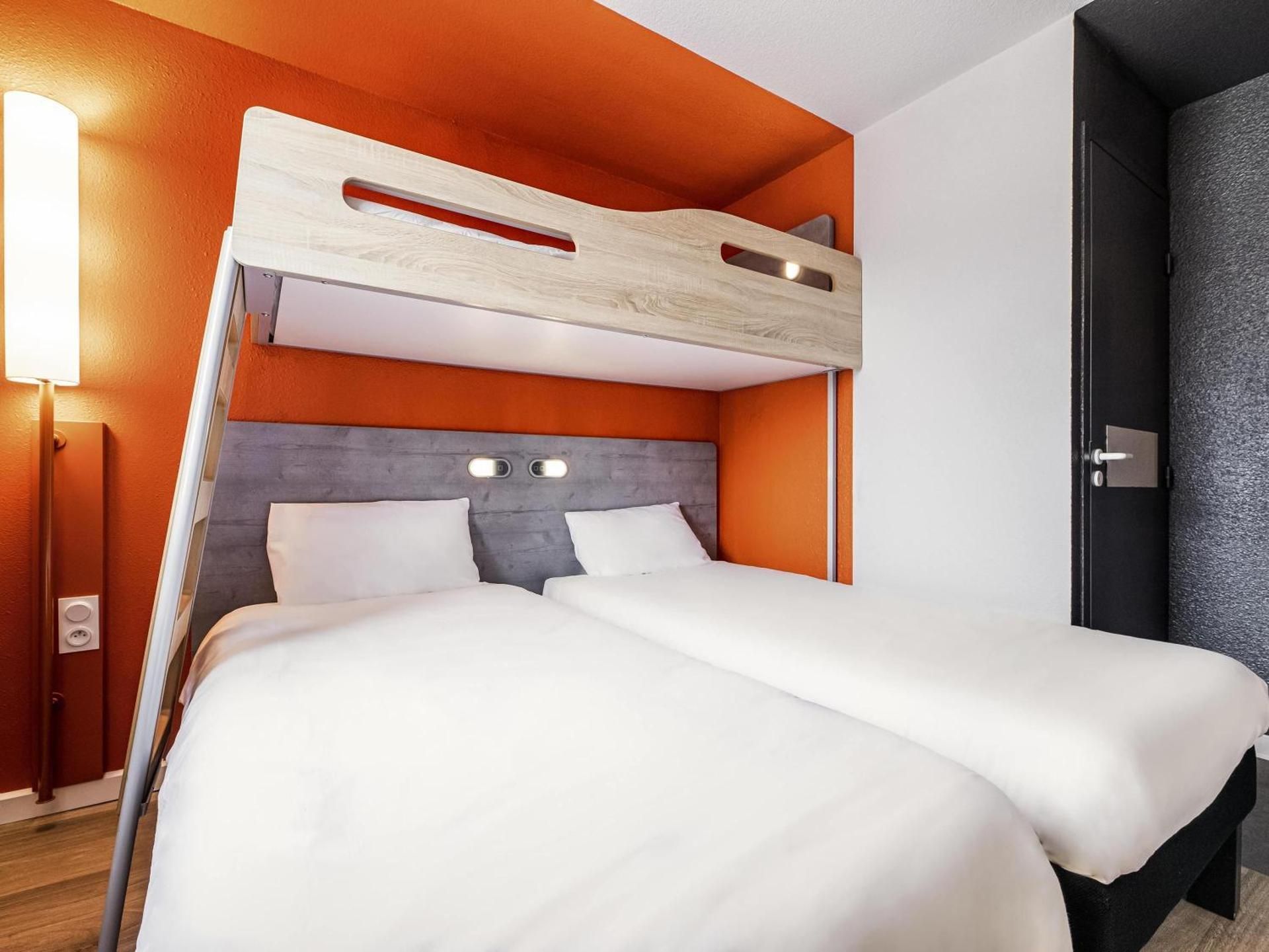 Triple Room with Two Single Beds and One Bunk Bed