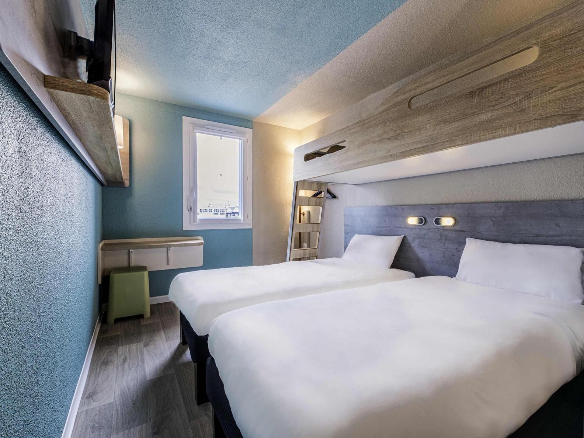 Triple Room with Two Single Beds and One Bunk Bed