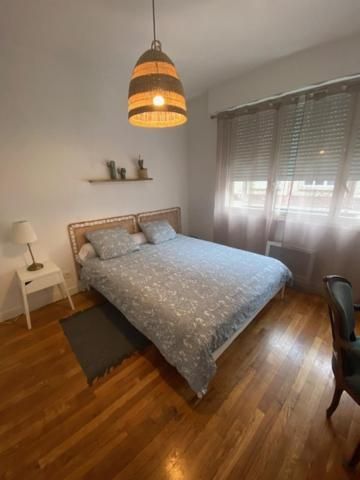 One-Bedroom Apartment with Balcony and City View