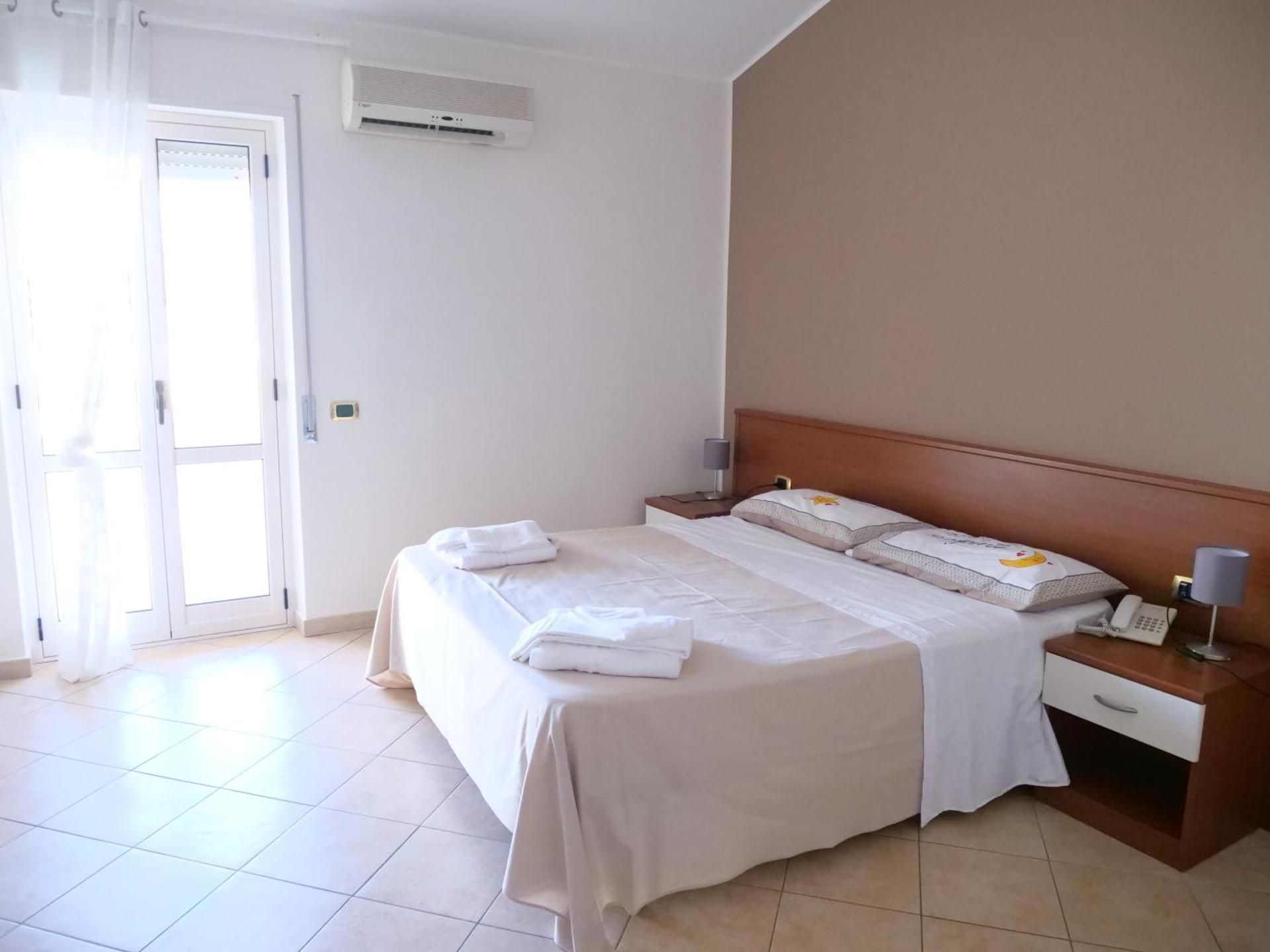 Quadruple Room with Private Bathroom