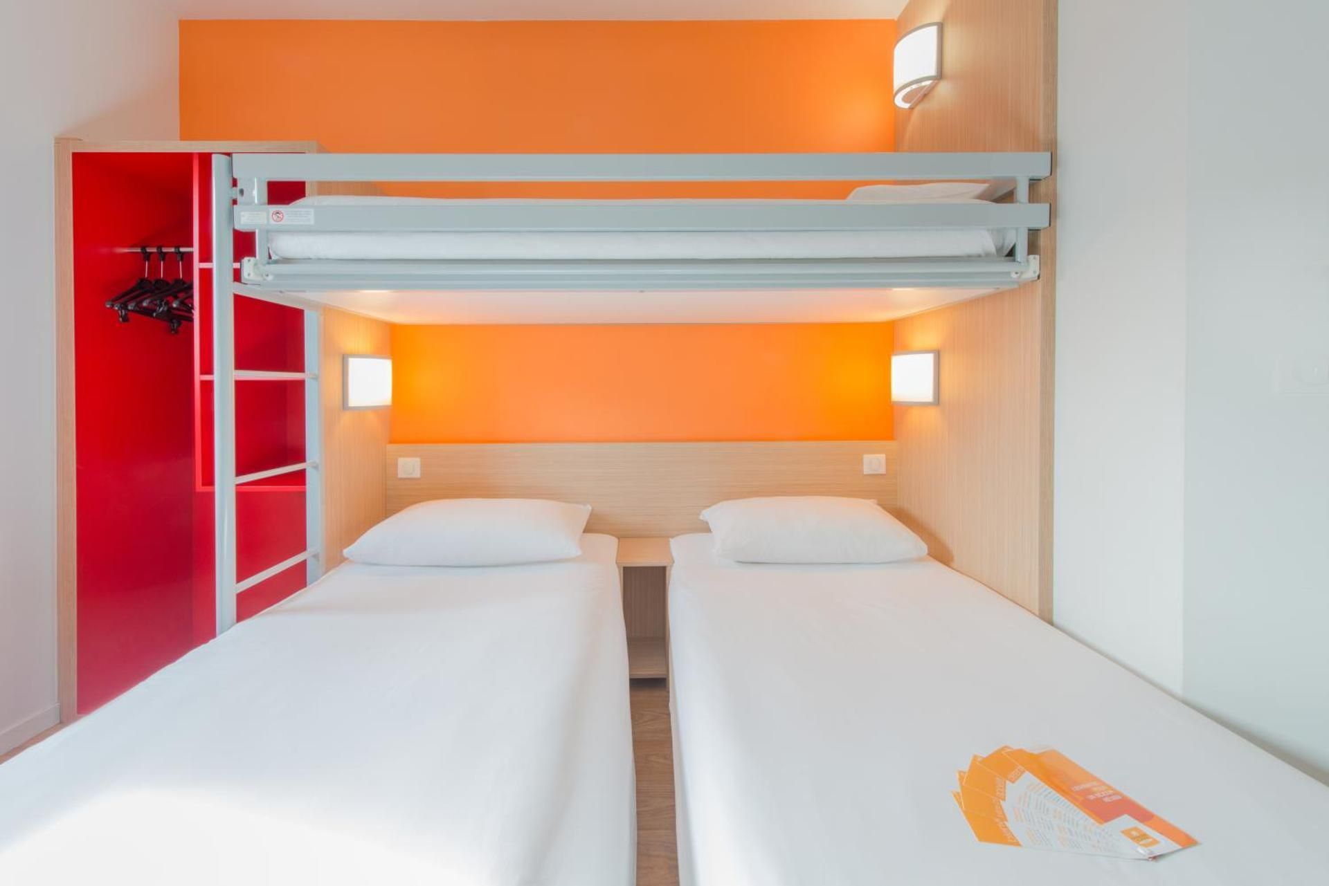 Triple Room With 2 Single Beds And 1 Bunk Bed