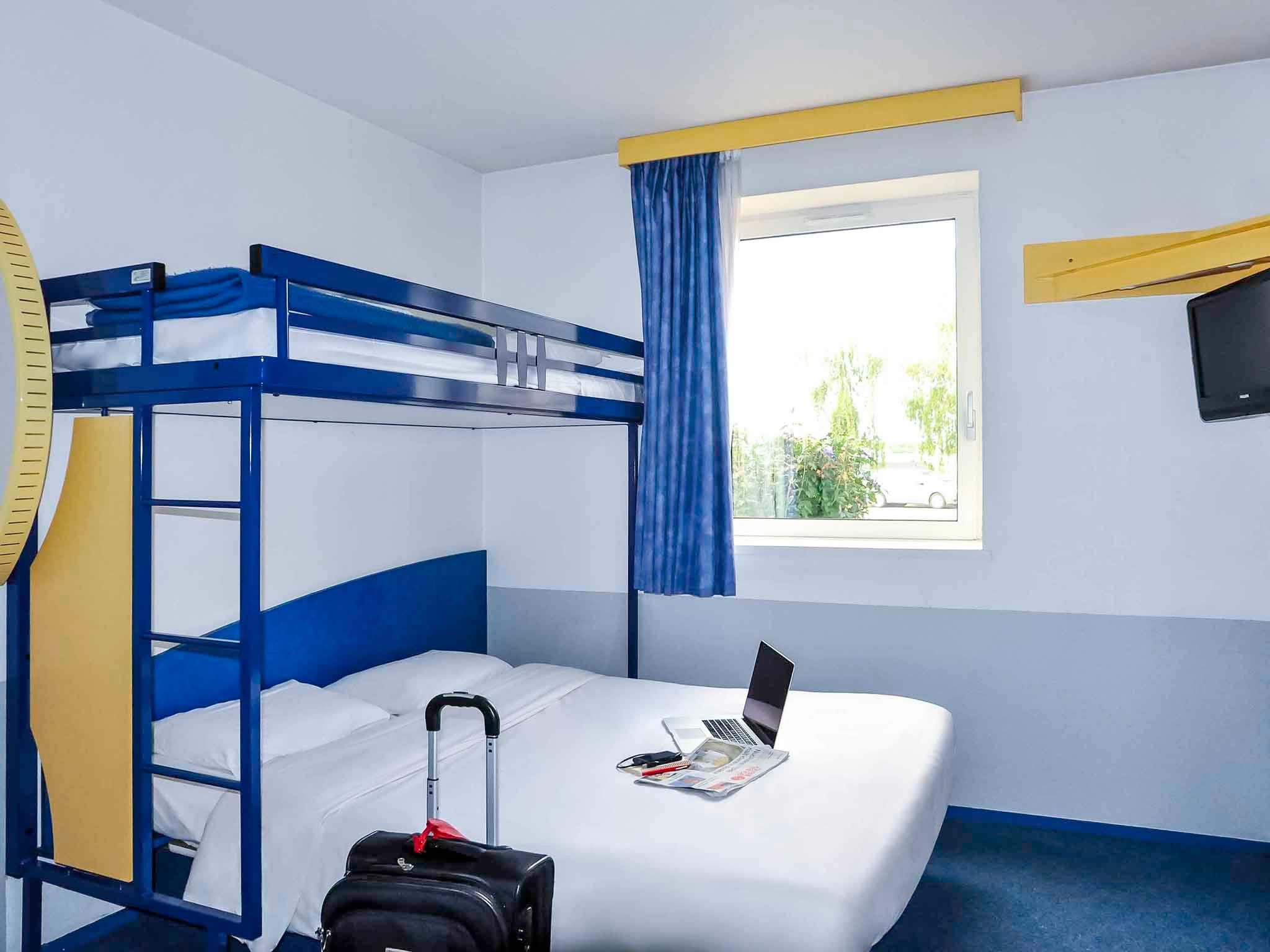 Triple - Room With A Large Bed And A Bunk Bed