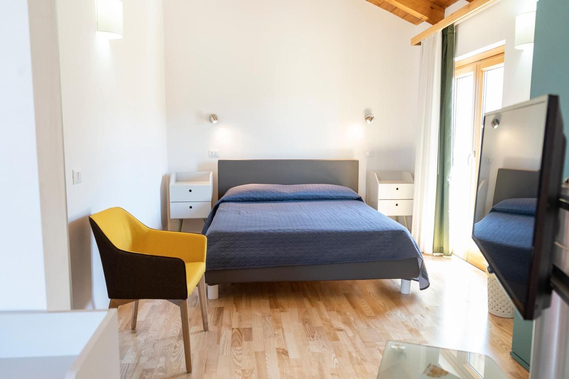 Quadruple Room with Balcony