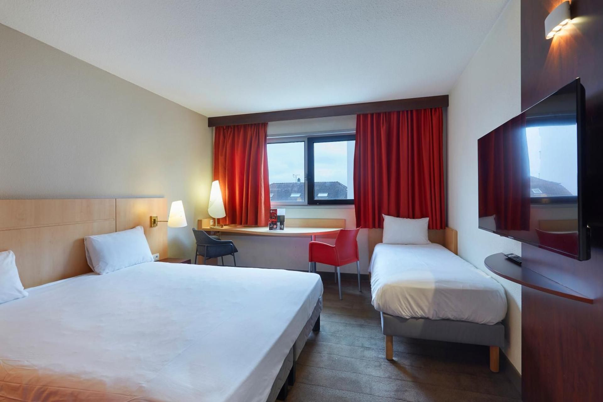 ibis Annemasse Standard Room with one double bed and one single bed