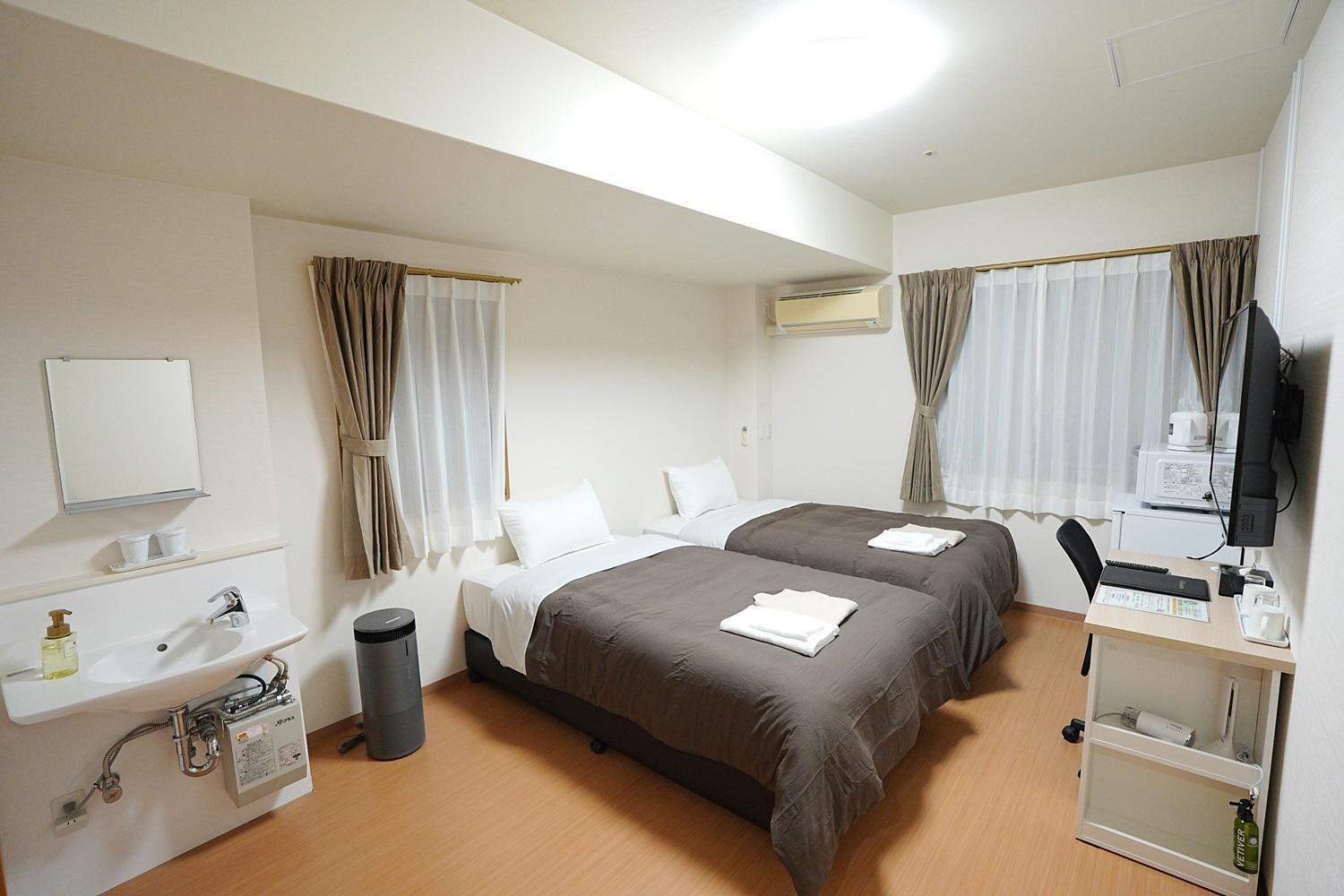 Twin Room with Private Toilet - Shared Bathroom