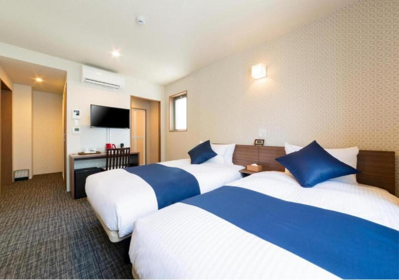 Twin Room with Private Bathroom