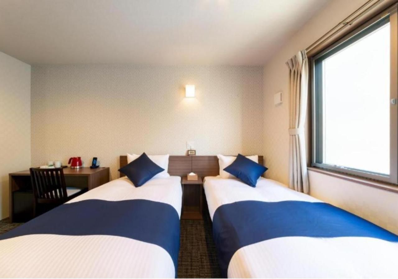 Twin Room with Private Bathroom