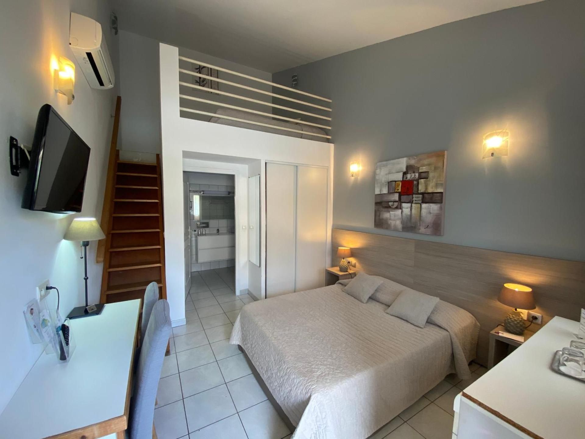 Quadruple Room (2 Adults + 2 Children under 12 Years)