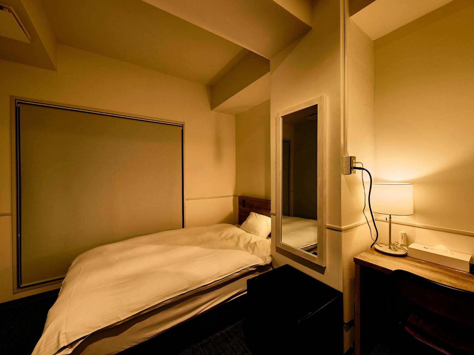 Single Room with Shared Shower and Toilet