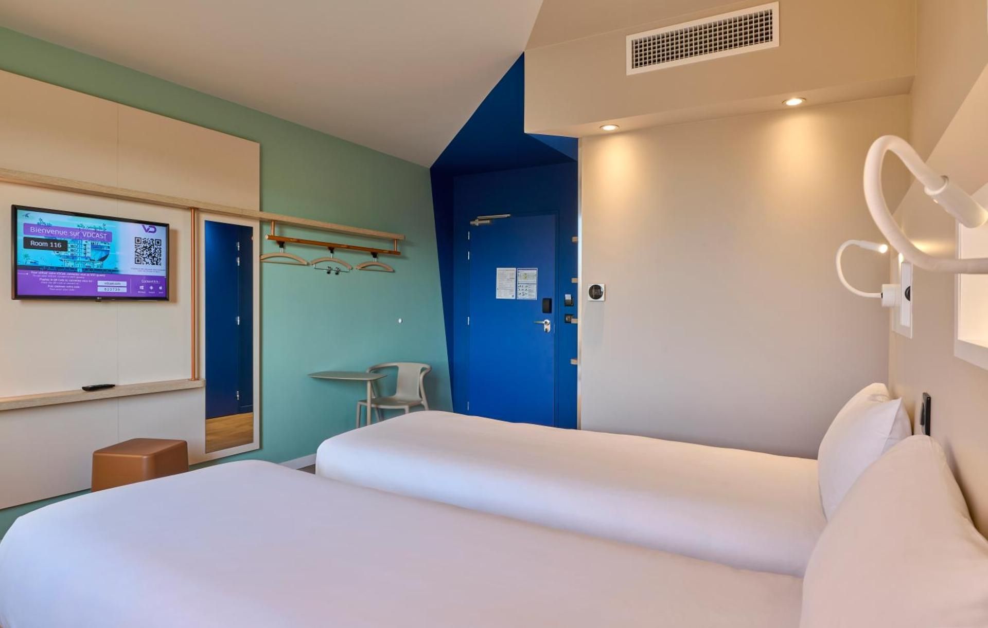 Triple Room with Two Single Beds and One Extra Bed