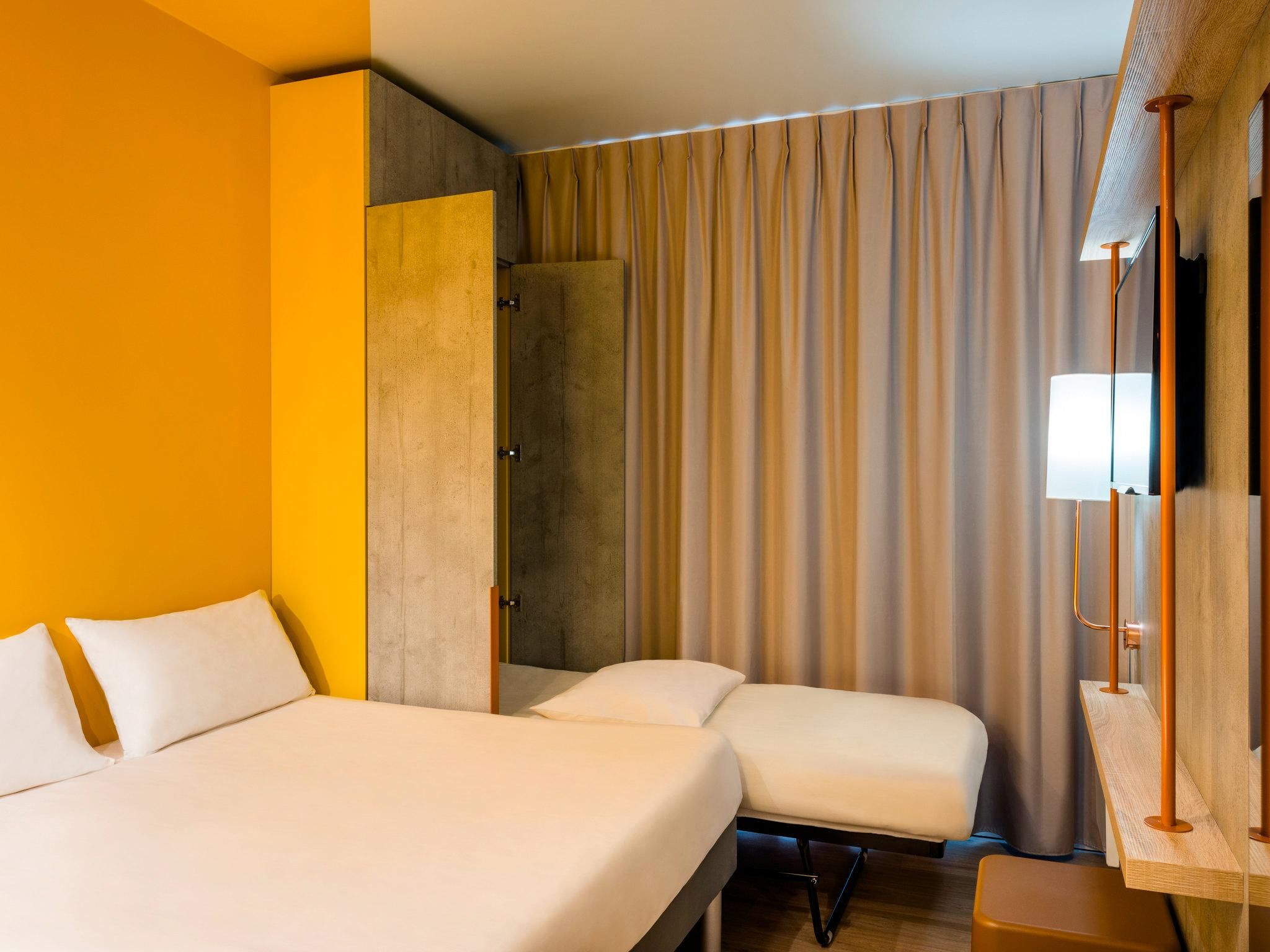 Family Room For 4 People With A Large Bed And 2 Single Beds