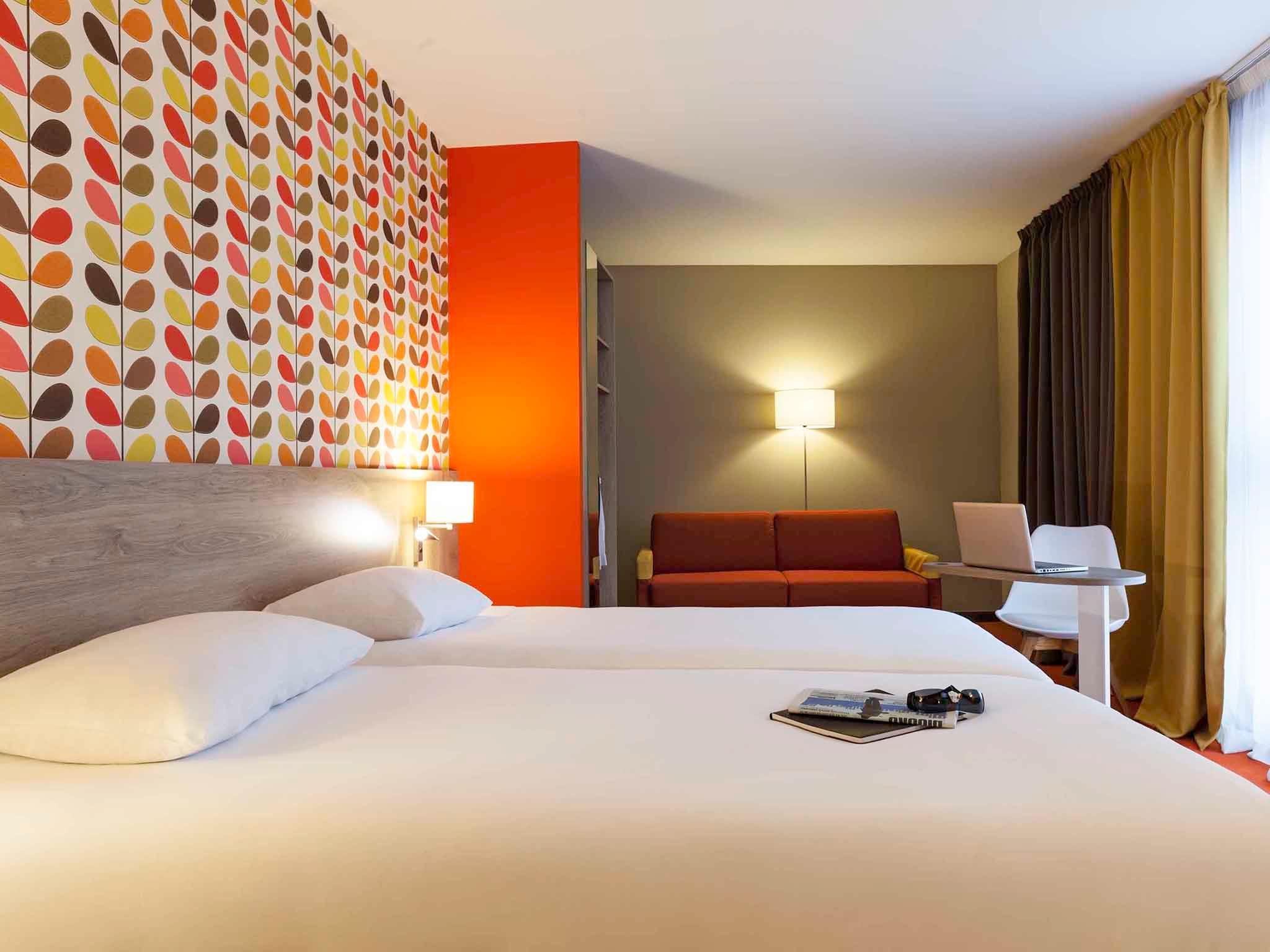 ibis Styles Chaumont Centre Gare standard family room with twin beds and a sofa bed