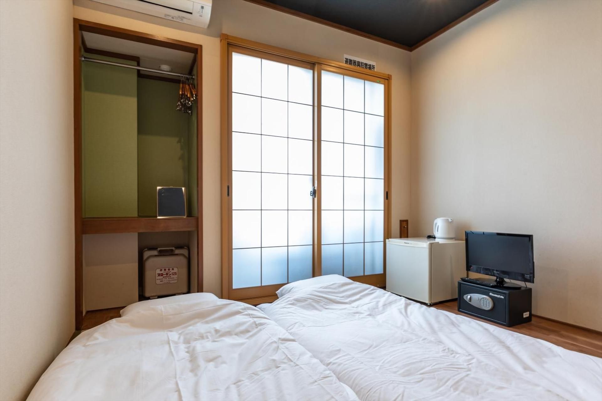 Quadruple Room with Private Bathroom