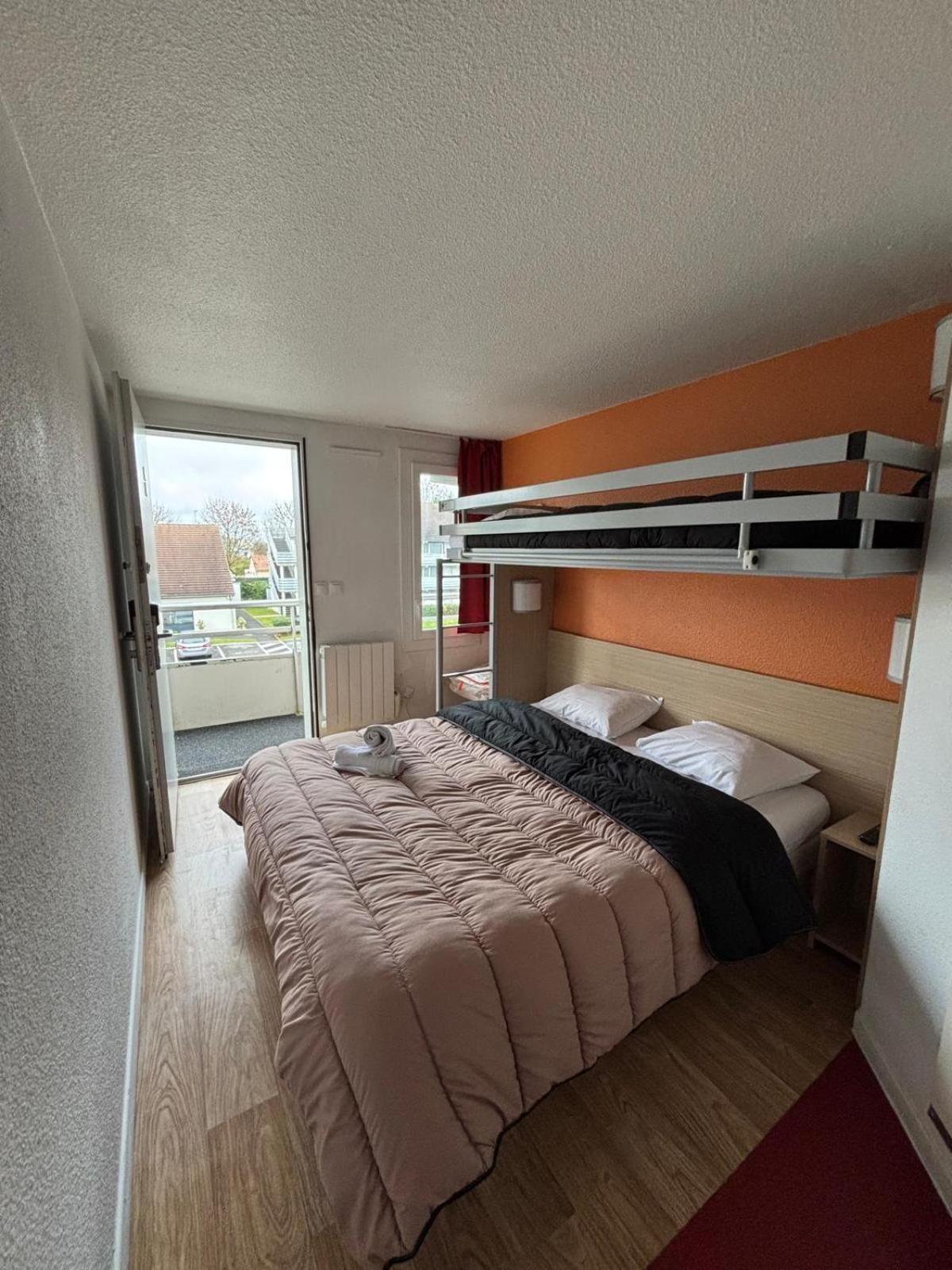 Triple Room (1 Double Bed + 1 Bunk Bed)