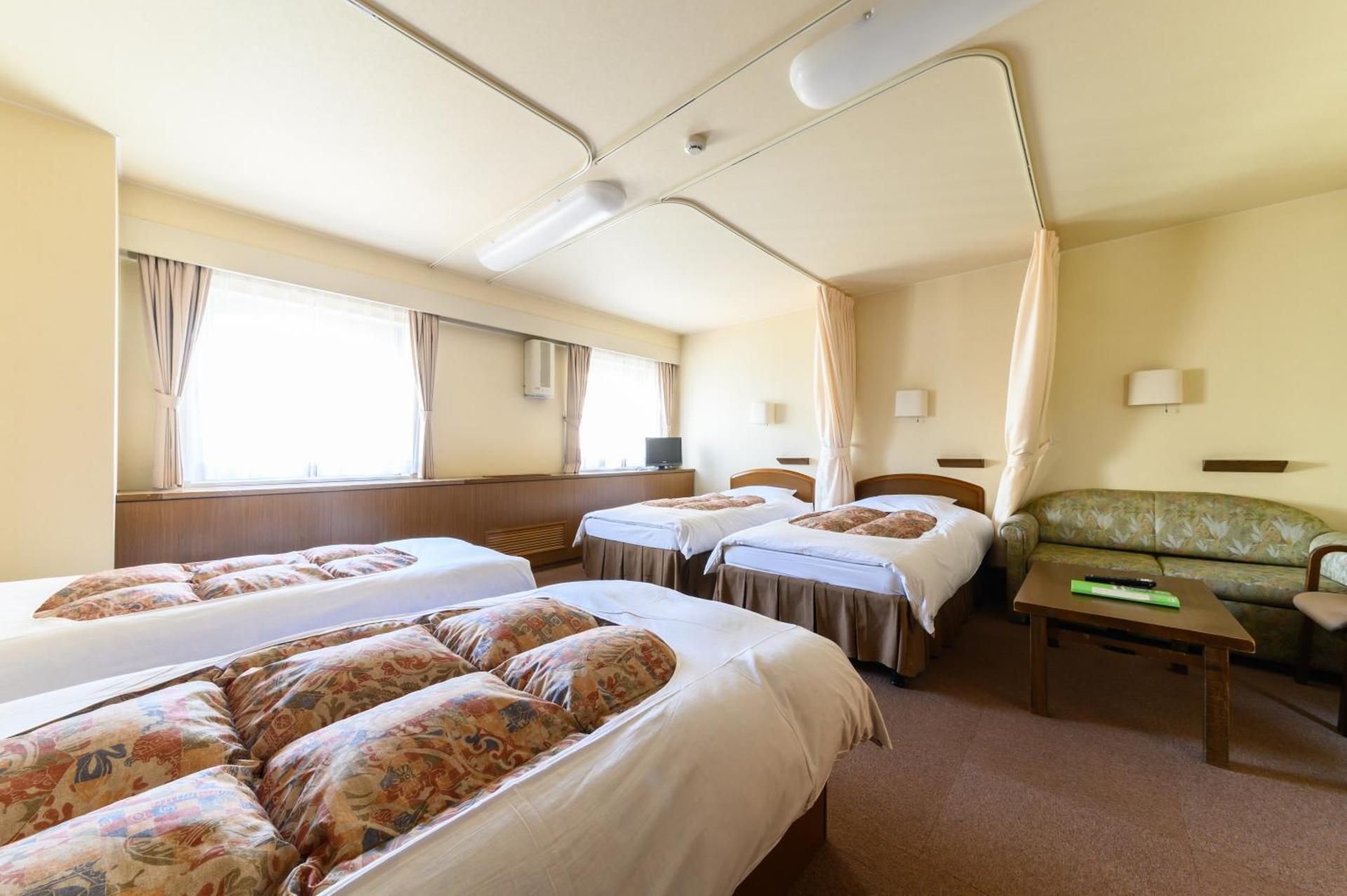 Economy Quadruple Room with Shared Bathroom