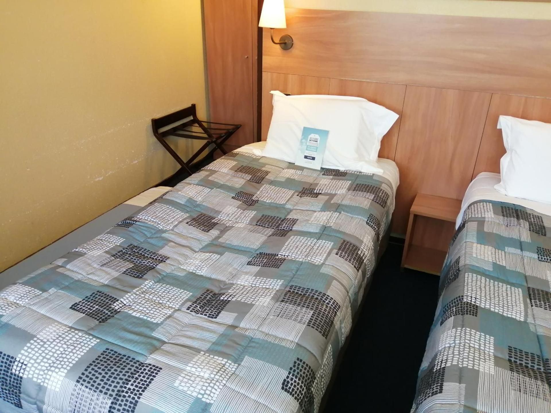 Triple Room with 2 Single Bed and 1 Junior Bed
