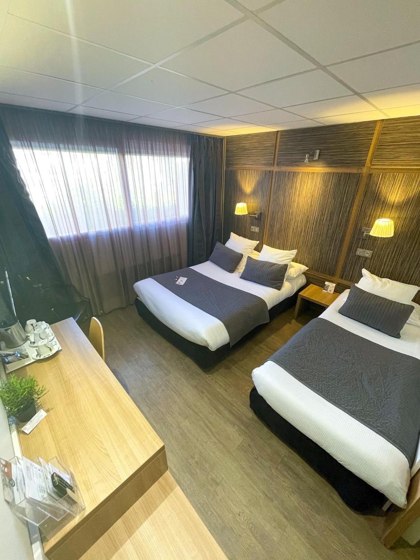 Standard Triple Room view court