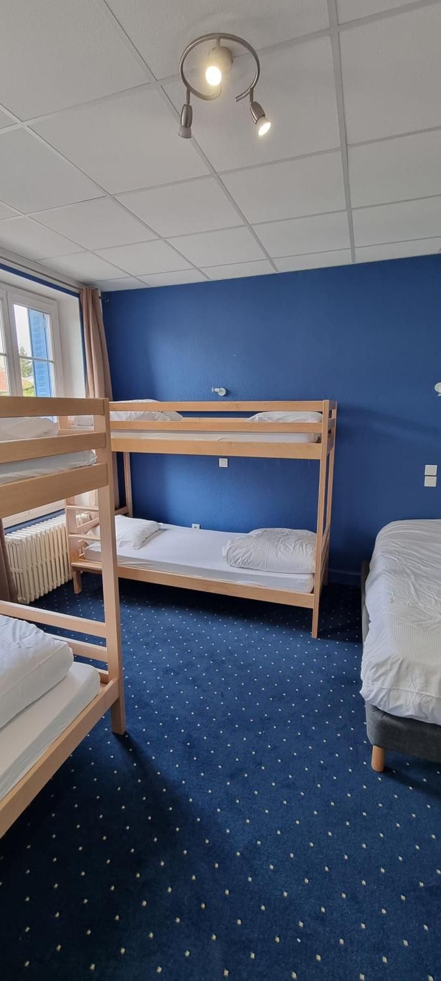 Single Bed in Male Dormitory Room