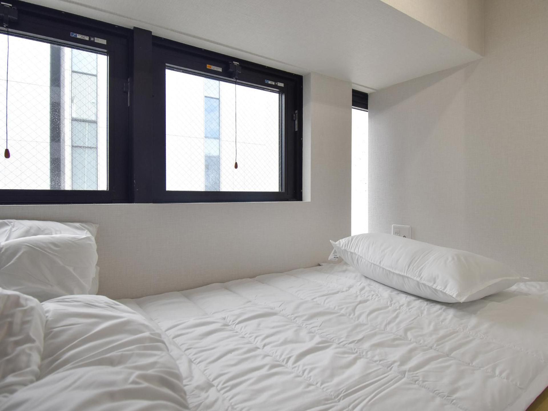 Single Bed in Female Dormitory Room