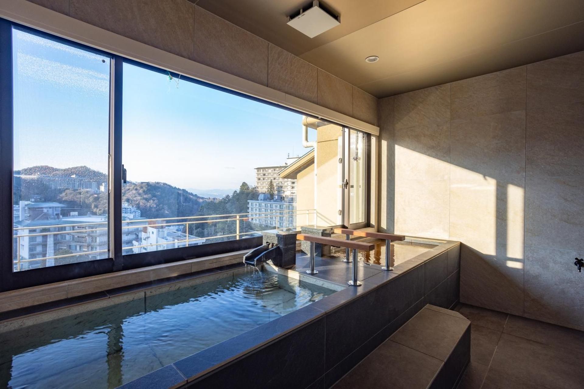 Premiere Suite with Two Different Types of Hot Springs on the Top Floor