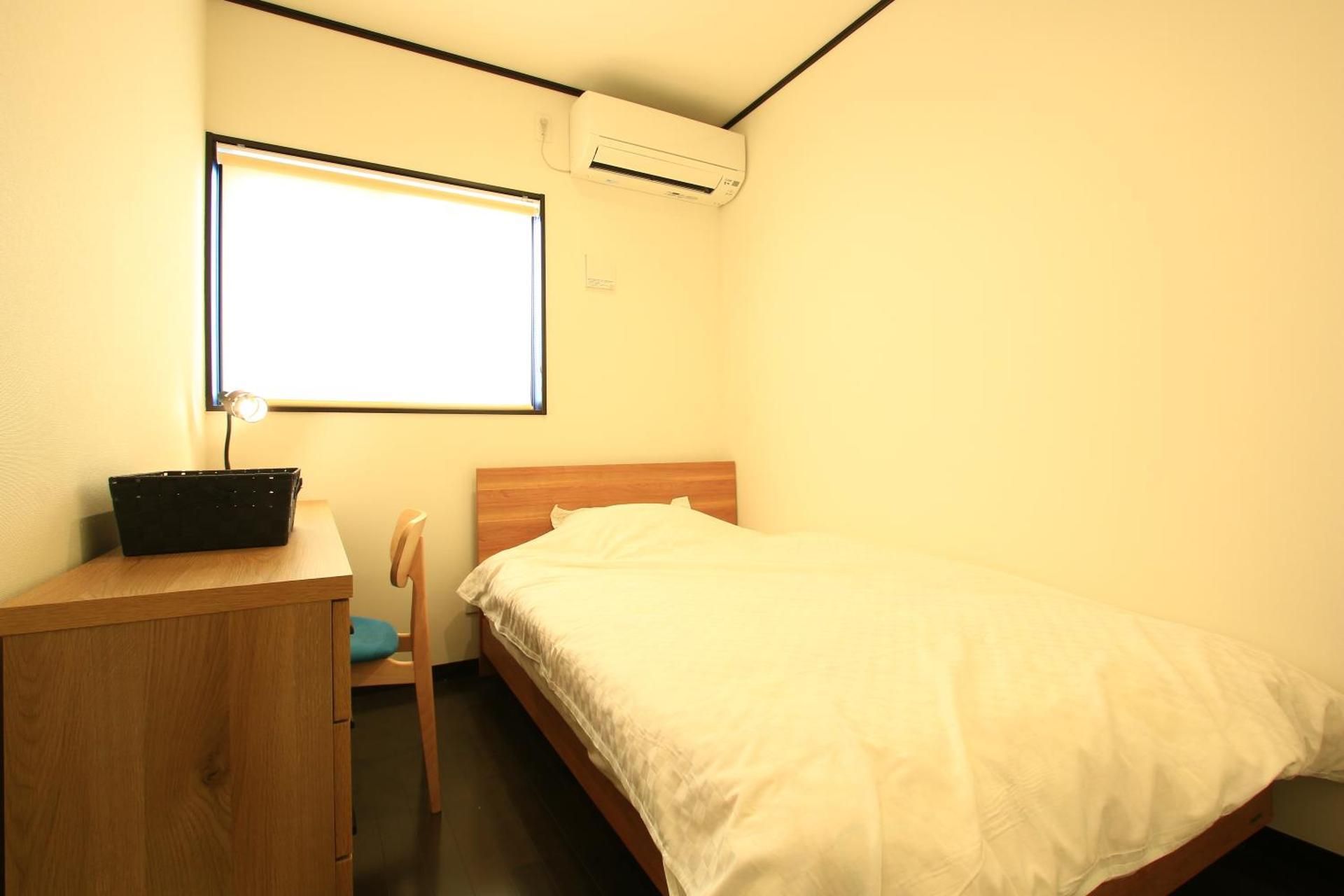 Single Room with Shared Shower and Toilet