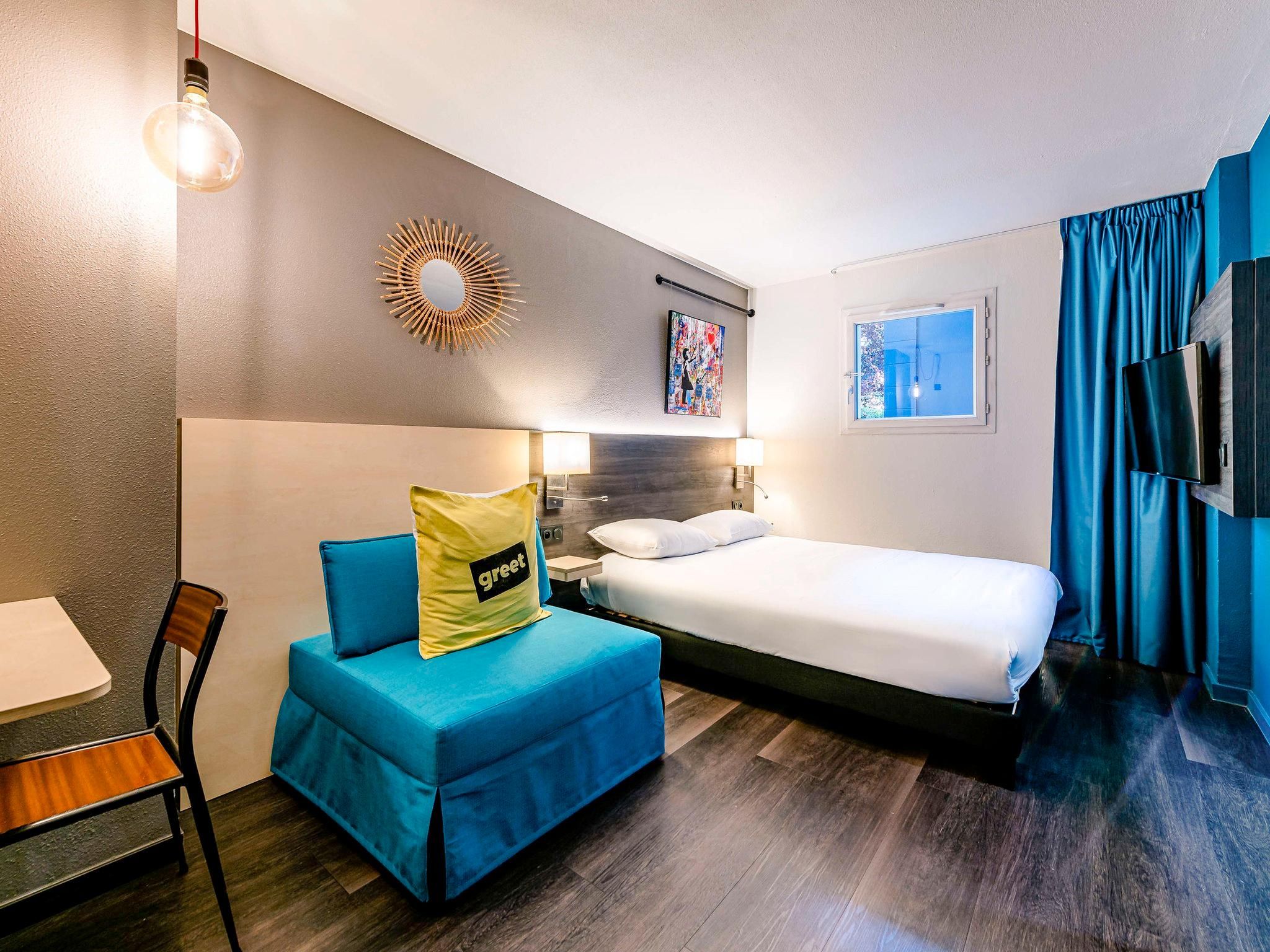 Superior POP Room with double bed and sofa