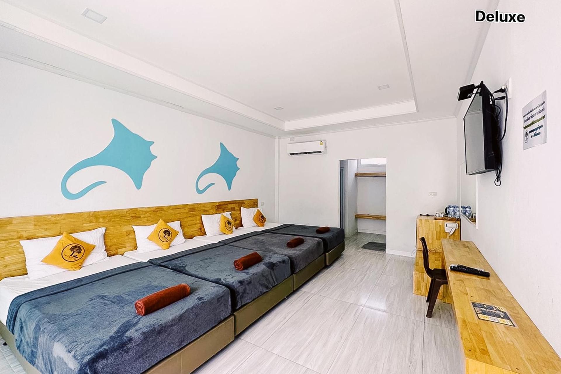 Deluxe Quadruple Room with 4 Single Beds