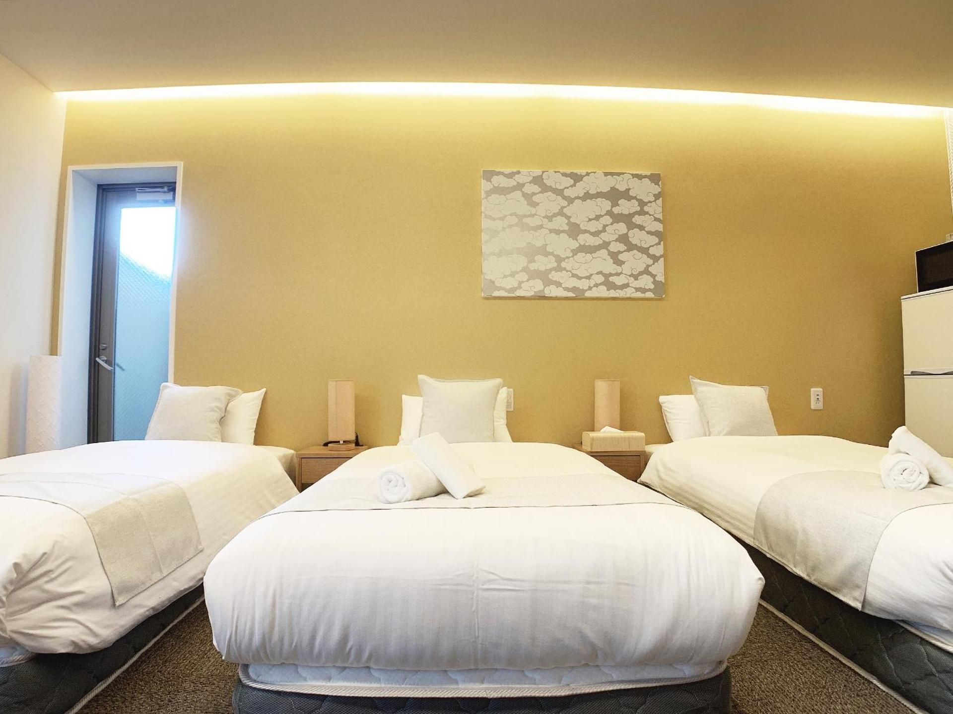 Deluxe Triple Room