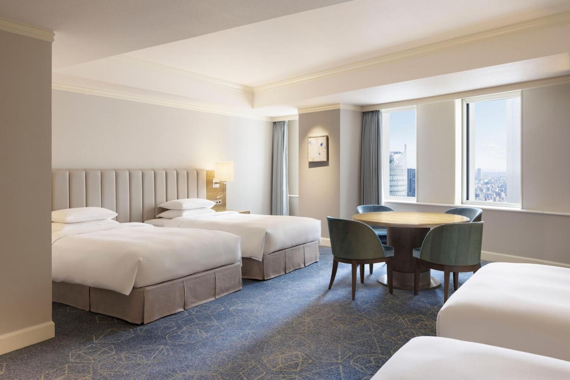 Family Room with Four Twin Beds and Partial City View