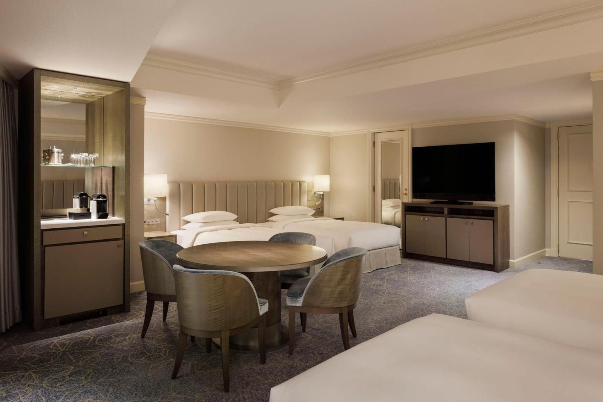 Family Room with Four Twin Beds and Partial City View
