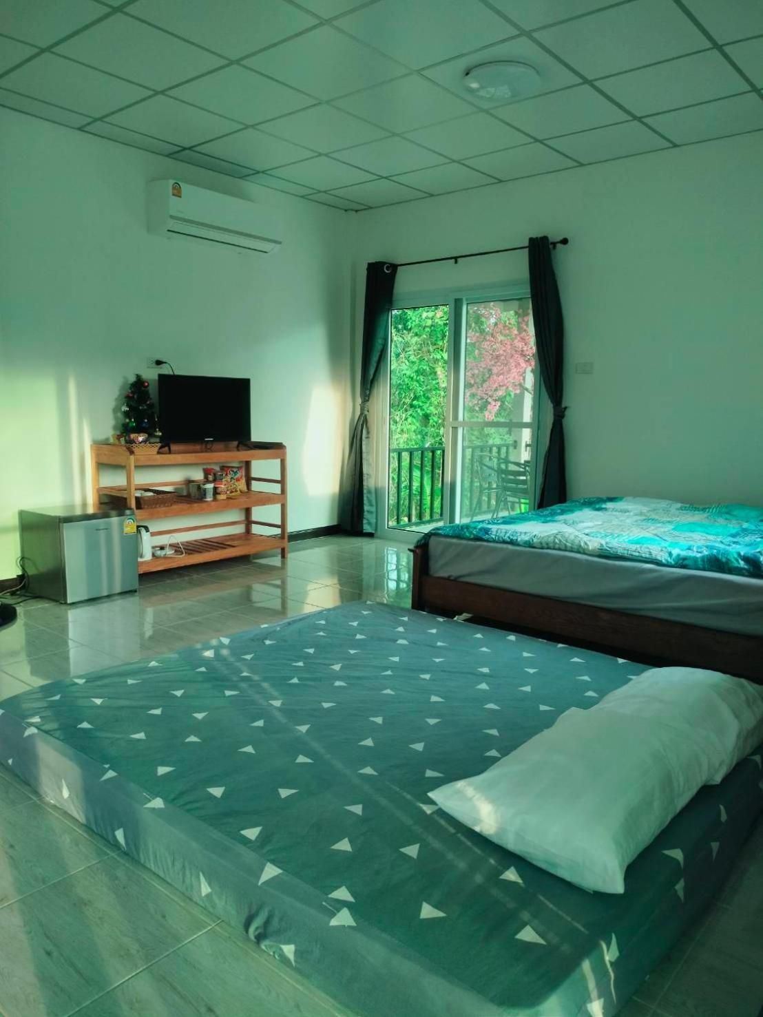 Baan Namthip Homestay Trang บ้านน้าทิพย์ โฮมสเตย์ตรัง Deluxe King Studio