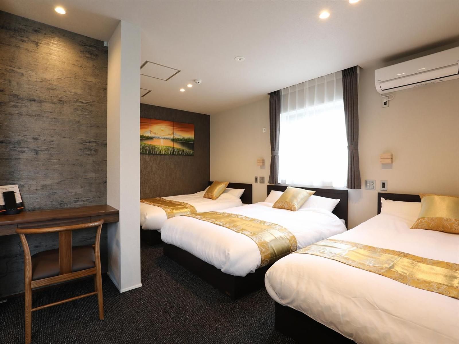 Deluxe Triple Room