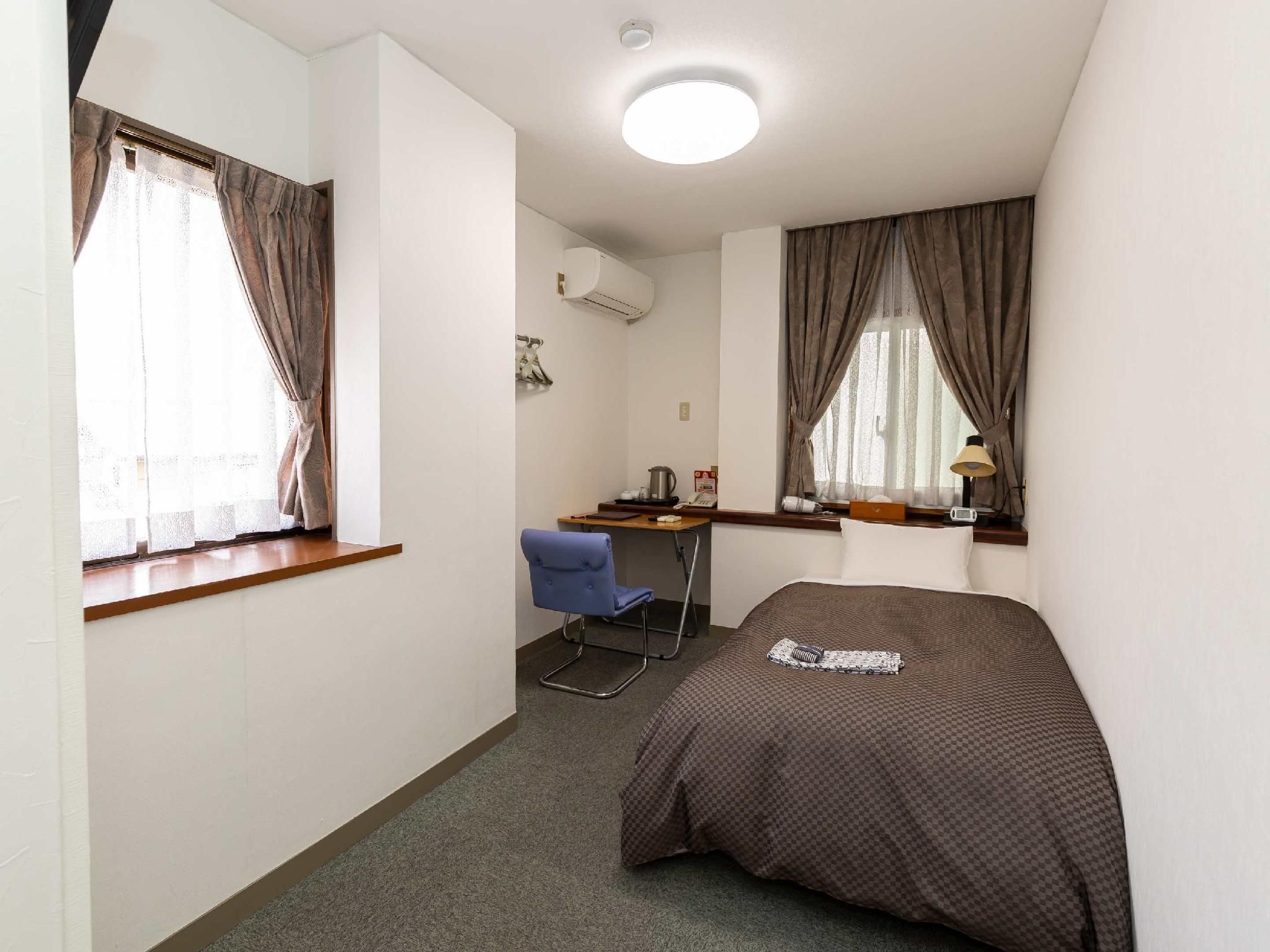 Single Room Shared Bathroom