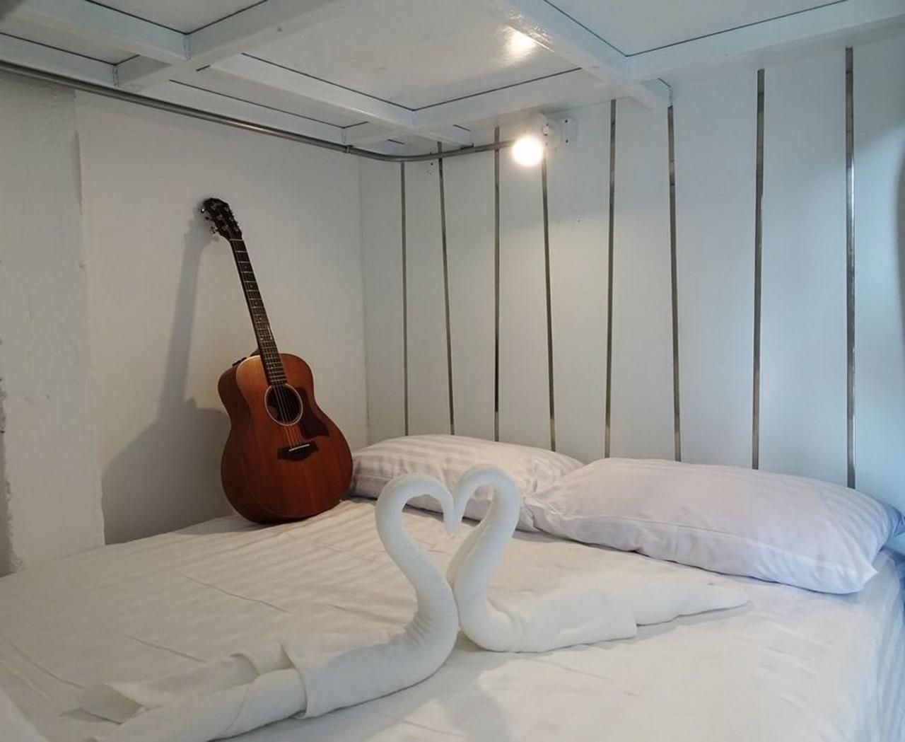 Lower Queen Bed in mixed Dormitory Room