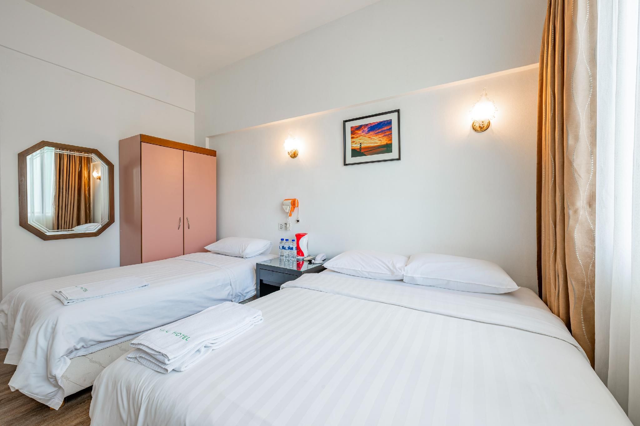 Deluxe Triple Room