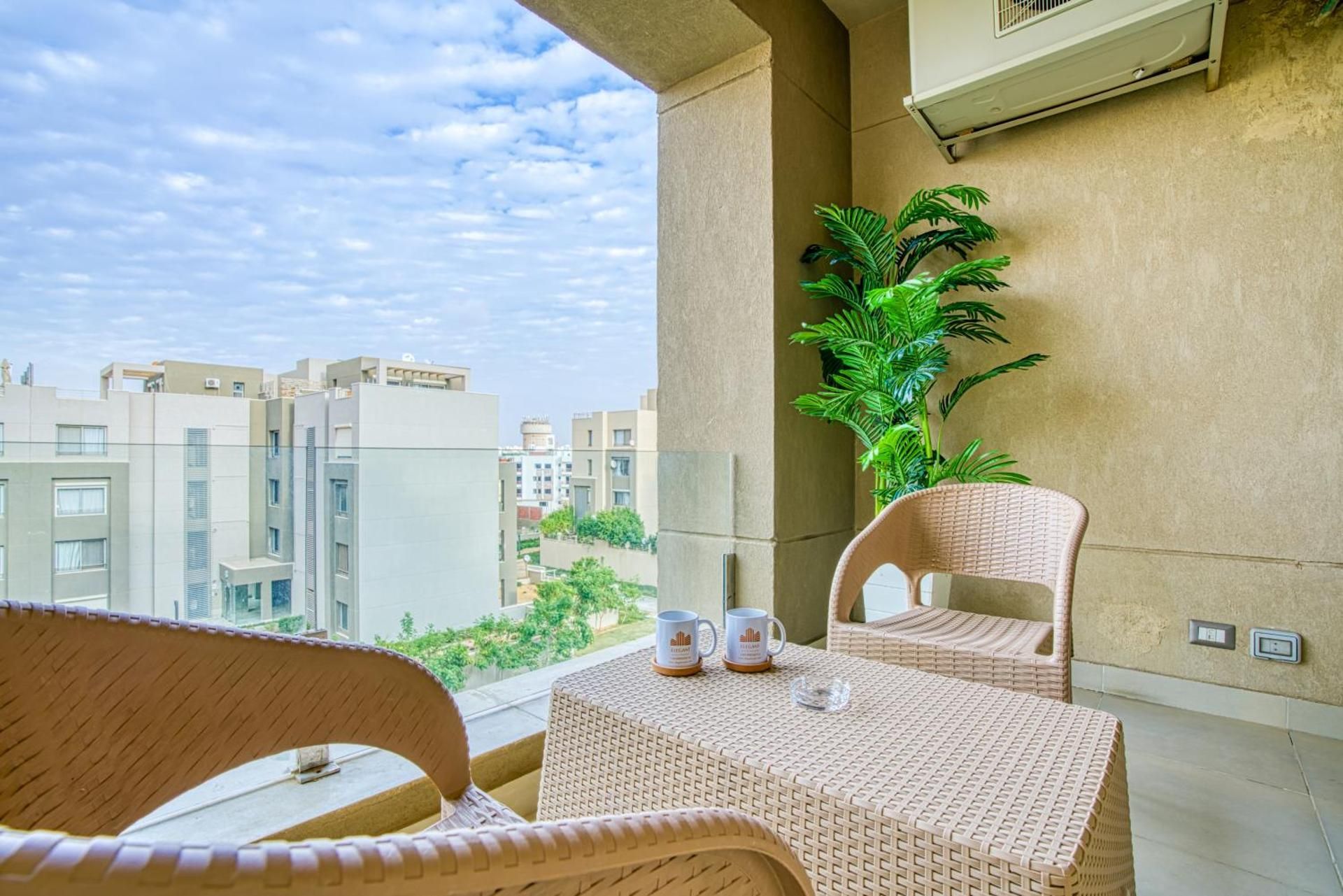 The Suites near AUC by Elegant Hospitality Apartment with Garden View