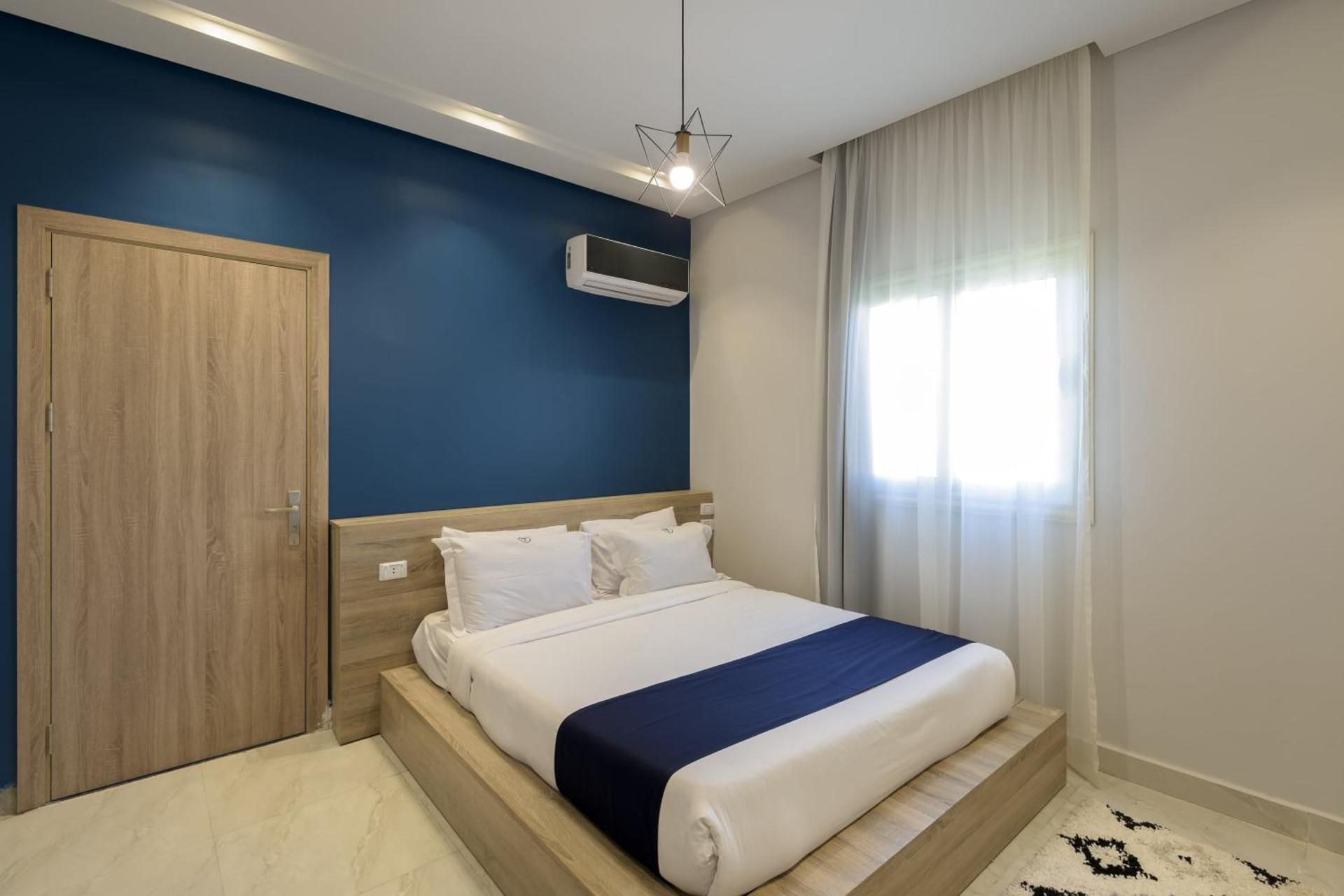 One-Bedroom Apartment with Balcony and City View