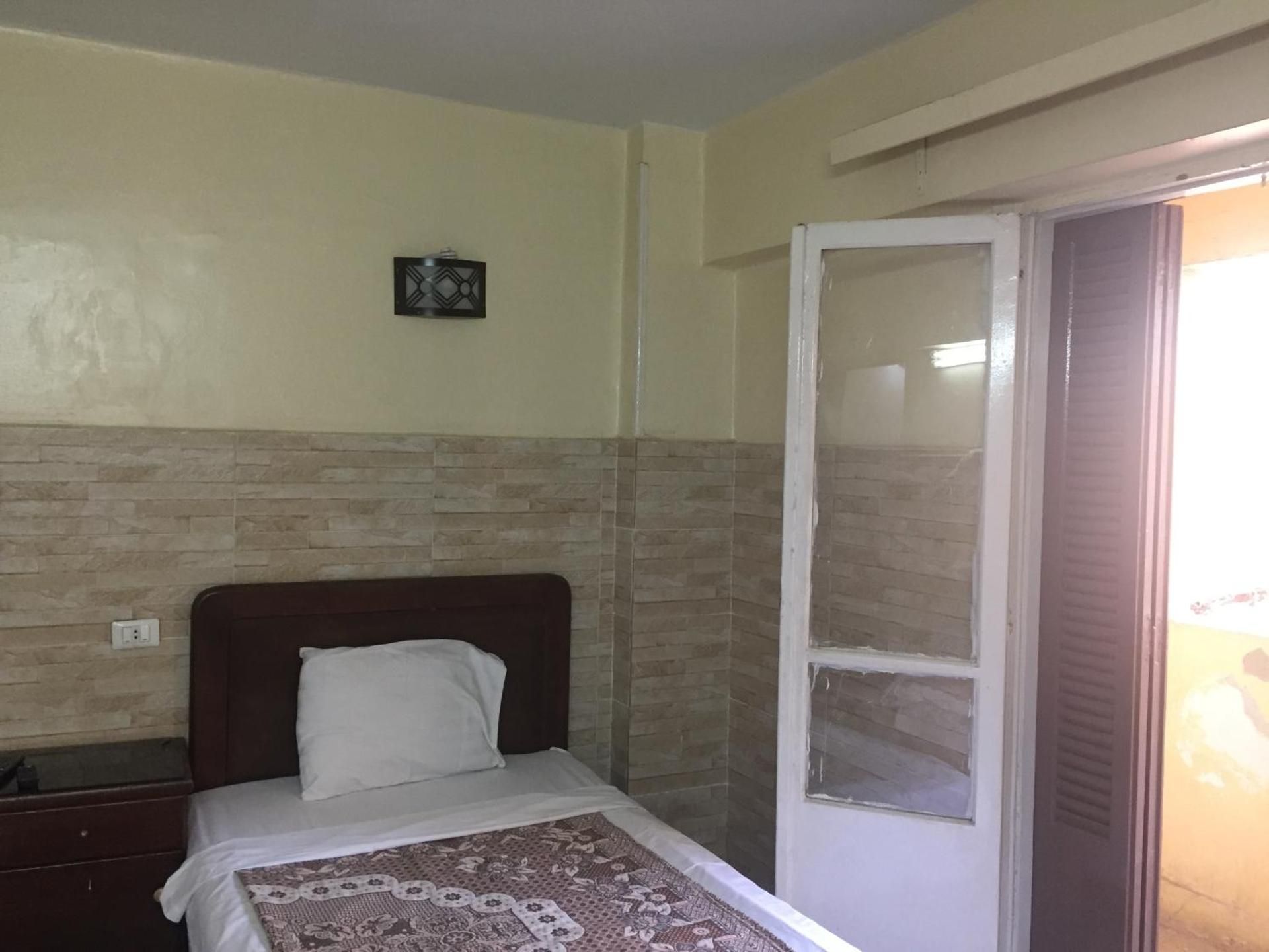 Single Room with Shared Toilet