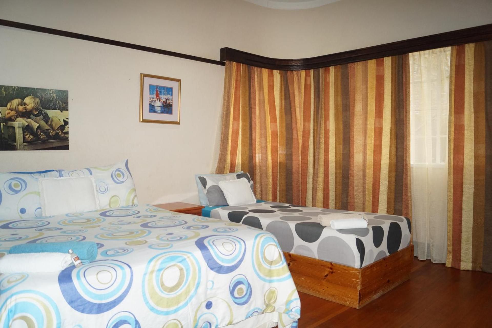 Economy Quadruple Room with Shared Bathroom