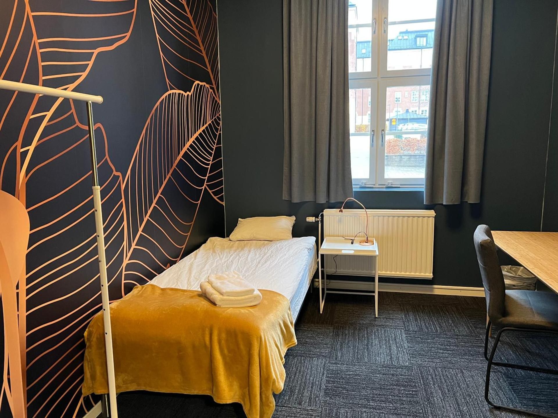 Single Room with Shared Shower and Toilet