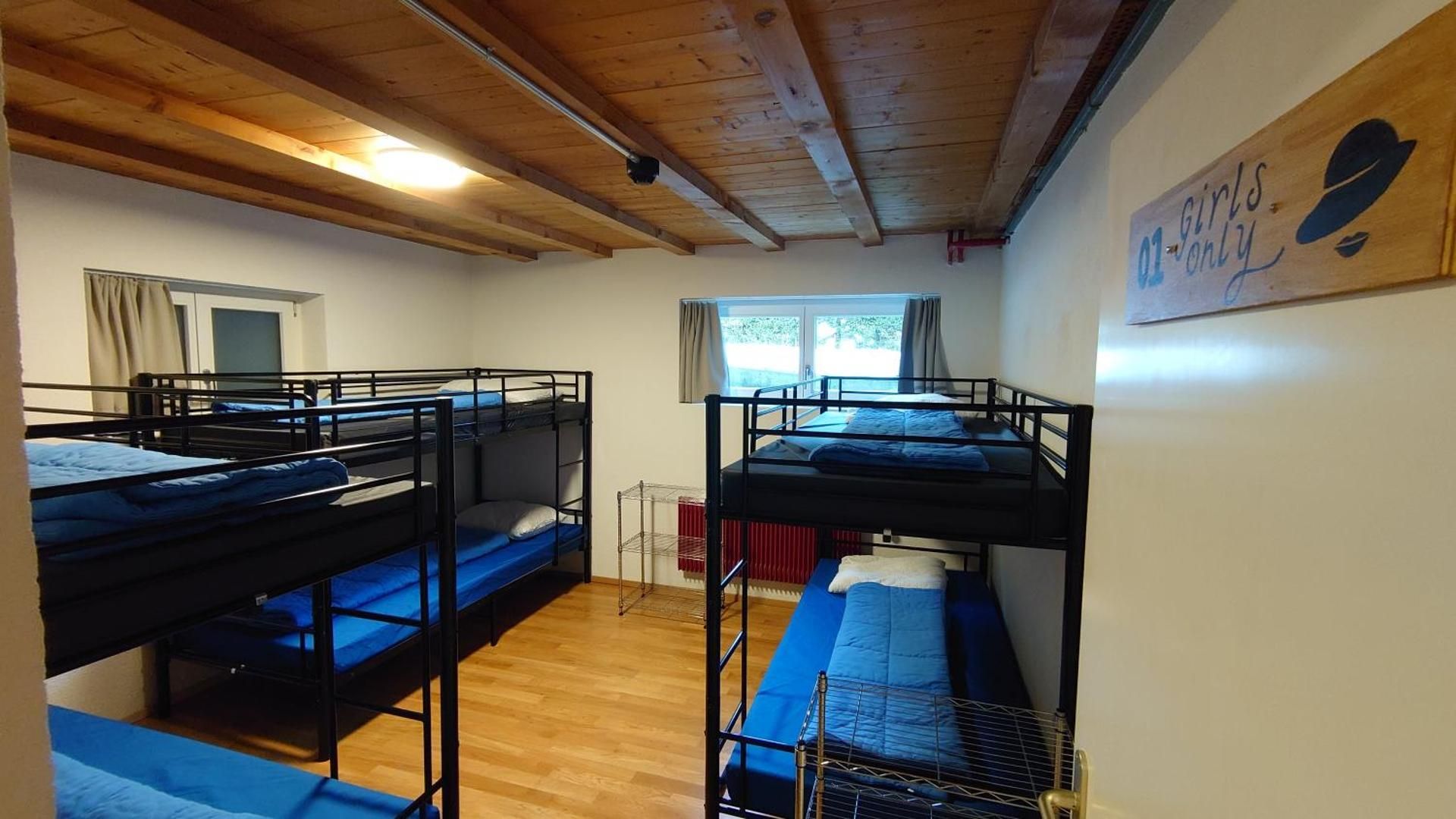 Bed in 6-Bed Female Dormitory Room with Shared Bathroom